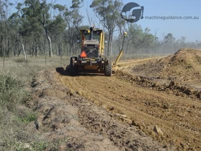Machine guided construction using a GPS grader rather than survey stakes.